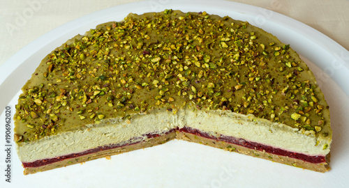 Very Delicious cheesecake with raspberries and pistachios