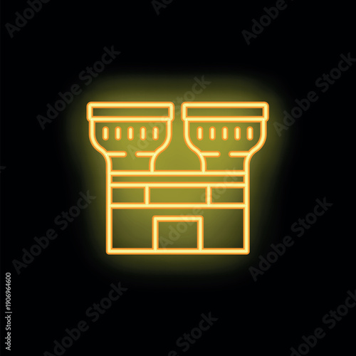 Bright neon yellow building shining in the dark, creating a vibrant and eye catching display