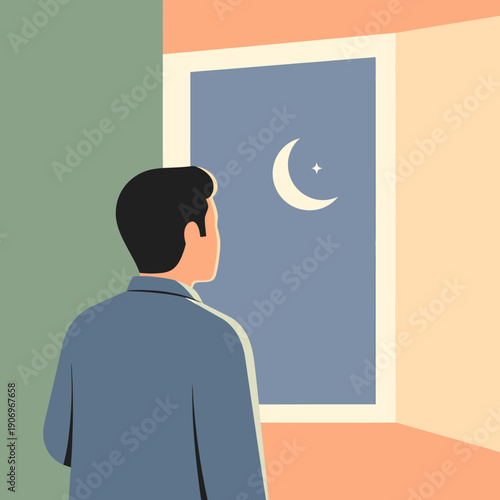 Man looking out the window at night.