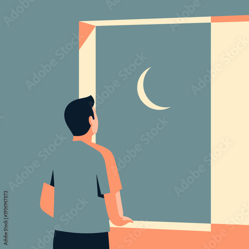 Man looking out the window at night.