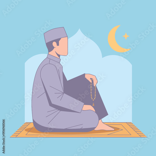 Man sitting on prayer mat reading Quran.