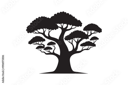 Majestic black and white tree silhouette with intricate branches and dense canopy creates a powerful and timeless natural symbol