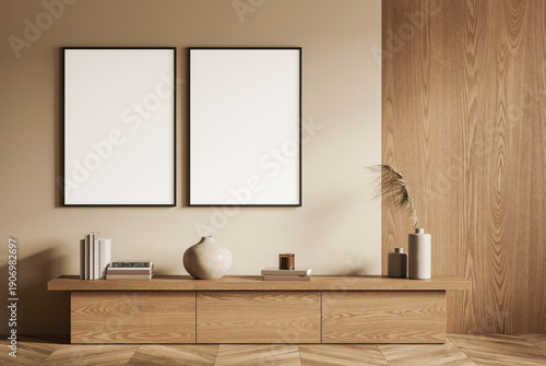 Two blank vertical posters in modern minimalist interior, wooden console with books and vases, on beige and wood panel wall. 3D Rendering