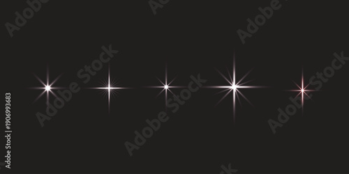 A row of five bright white starburst lights on a dark background