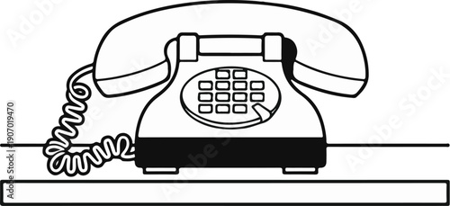 Retro rotary dial telephone with coiled cord on a shelf