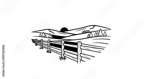 Rustic wooden fence in rolling hills with sun low on the horizon