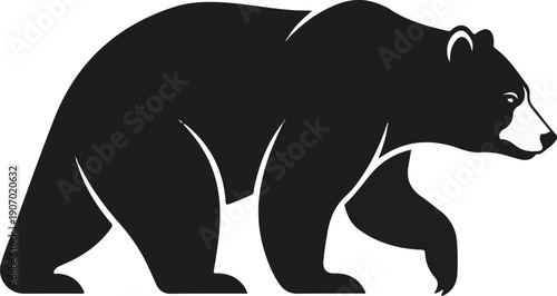 Silhouette of a black bear walking, shown from the side