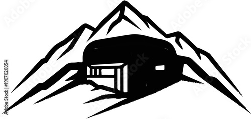 Silhouette of a camper van nestled within mountains