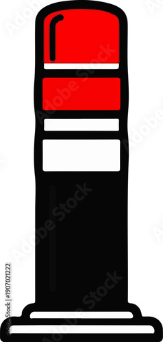 Red and white striped traffic bollard with a black base