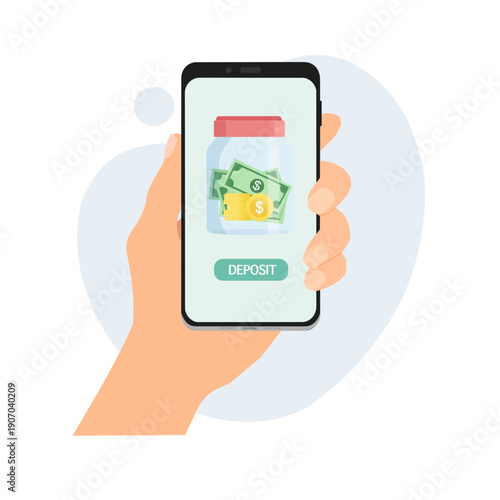 Hand holding smartphone showing money jar and deposit button on screen. Mobile banking, online savings and financial management concept