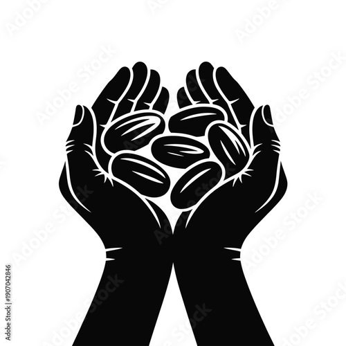 Hands gently cupping a collection of dark organic coffee beans