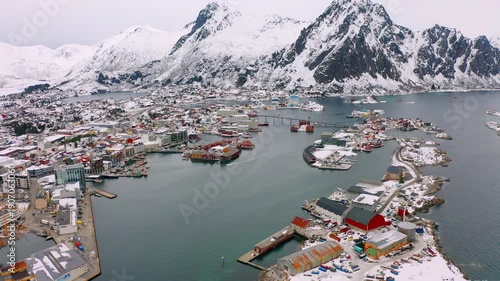 4k drone flight moving to the side footage (Ultra High Definition) of Henningsvaer town, Lofoten Islands, Norway. Splendid spring seascape of Norwegian sea. Traveling concept background.