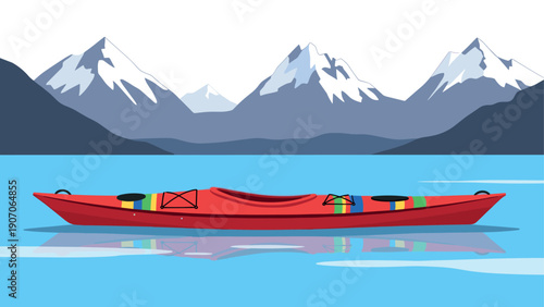 Red canoe on serene lake with snow-capped mountains in the background