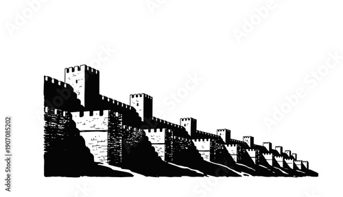 Ancient fortified wall with towers on rugged landscape