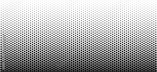 Abstract monochrome halftone background featuring a vertical gradient transition of black hexagonal honeycomb shapes decreasing in size towards a white top section