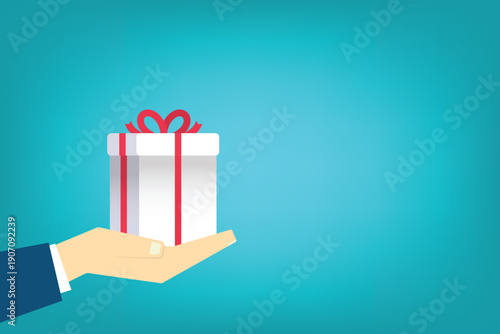 Hand holding or offering gift or present
