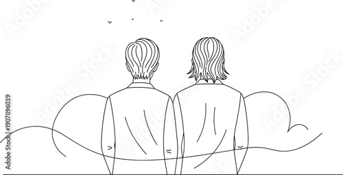 Two people sitting on ground looking away with birds flying overhead line black and white back view