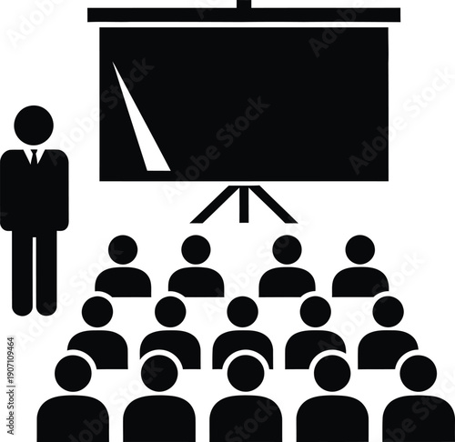 Businessman presenting to engaged audience in modern conference setting