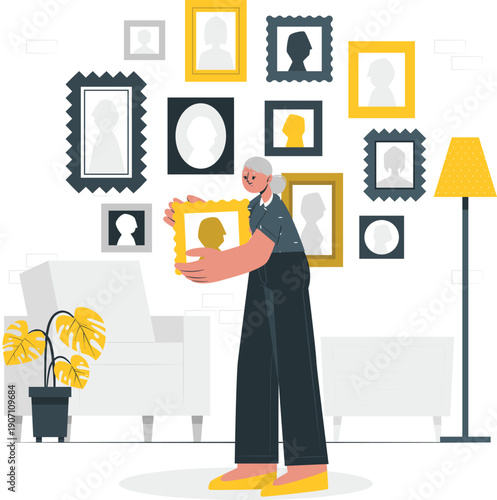 An elderly person arranging framed silhouettes in a modern living room with furniture and decor