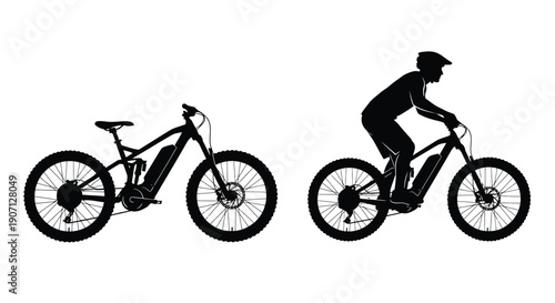 Silhouette of an electric mountain biker riding a full suspension bike