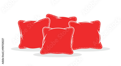 A collection of four vibrant red hand stitched cushions arranged on a white surface