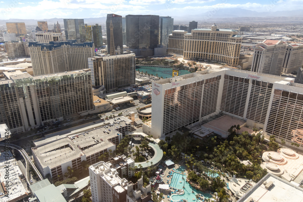 Fototapeta premium Las Vegas, Nevada, USA - March 3rd, 2024: Wide aerial view Las Vegas strip Flamingo Bellagio Caesars Palace hotels city skyline