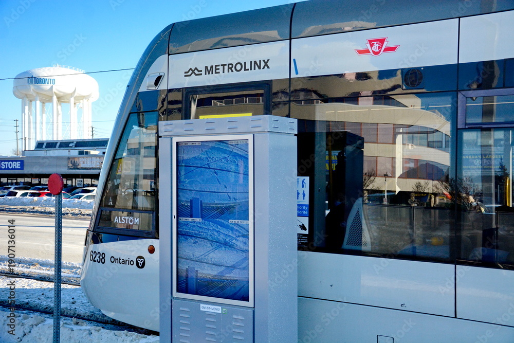 Fototapeta premium Toronto, Ontario, Canada, February 8, 2026: Opening day of the Line 5 Eglinton Crosstown LRT. After 15 years of construction, the 19 km, 25-station, east-west transit line finally opened on this day t