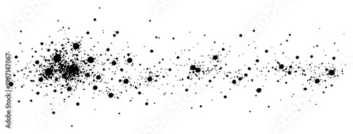 Minimalist horizontal spray of black ink dots and paint splatters on white background