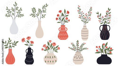 Set of various stylish ceramic vases filled with different types of colorful flowers and green leaves for decor.