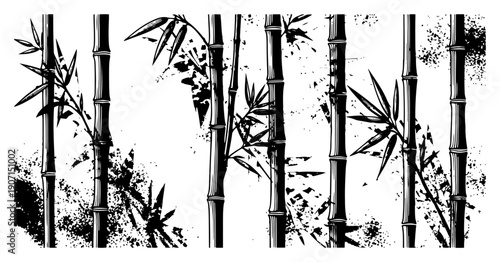 Hand drawn vintage engraving style bamboo stalks and leaves with artistic ink splatters