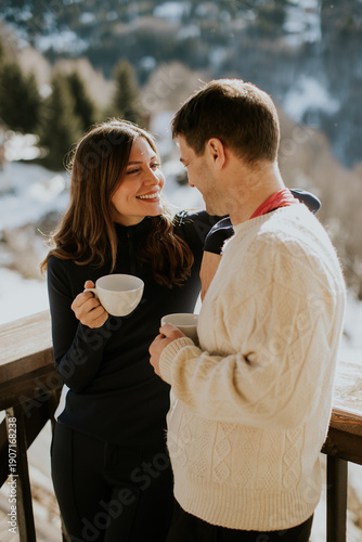 A couple shares smiles and ...