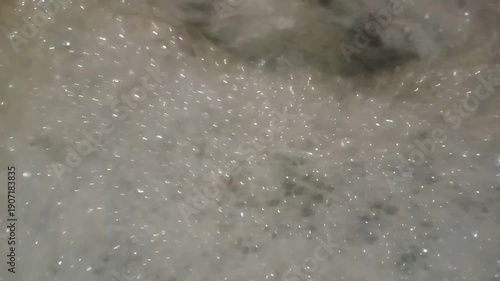 Close-up of Boiling Thick Liquid with White Bubbles