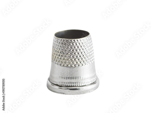 Slika na platnu Silver thimble with textured surface for sewing projects