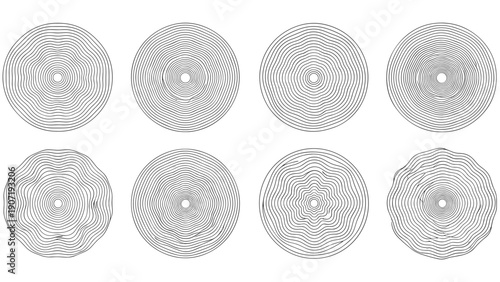Collection of eight abstract circular tree ring patterns features unique concentric line designs for wood texture or natural growth themes.