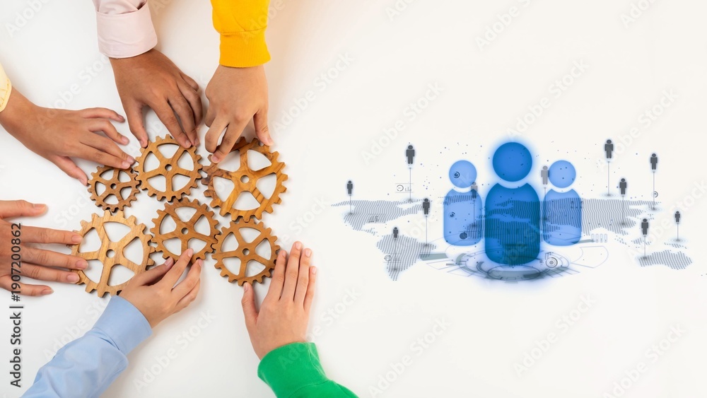 Obraz premium This image captures hands assembling gears, symbolizing teamwork and innovation. The digital elements represent modern communication tools essential for collaboration. Raster