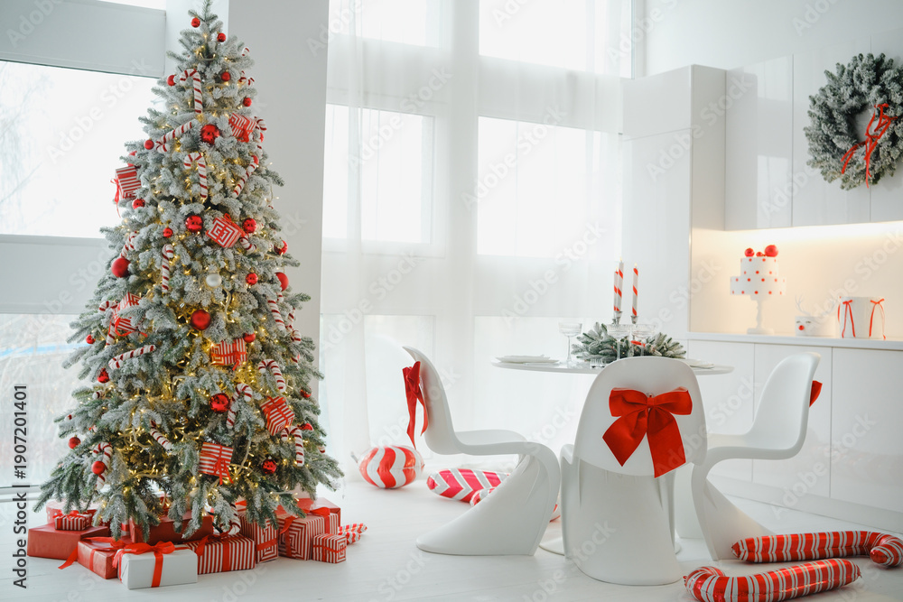 Fototapeta premium Elegant white room decorated for Christmas with a festive tree and gifts