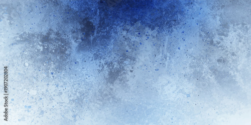 Frozen blue water drops on a window and wall surface create a cold winter texture with liquid splashes, foam bubbles, and a grunge nature pattern for a decorative backdrop wallpaper