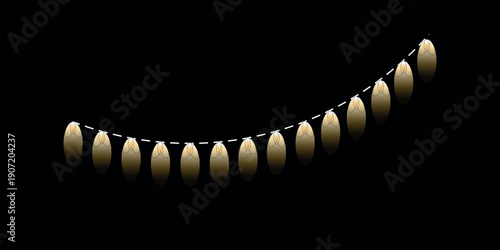 A string of glowing candles in a dark room