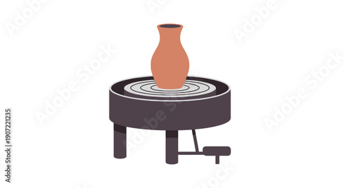 Potter shapes clay vase on rotating pottery wheel in studio