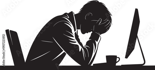 Stressed man with head in hands at desk with computer, representing burnout and workload