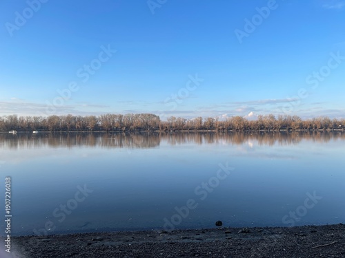 Photography Mirror-Like River Reflection Beneath Clear Blue Winter Sky