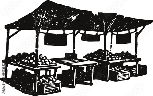 empty outdoor market stalls with canopies and crates filled with produce