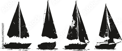 set of four black silhouette sailboats with worn and grunge textured sails and hulls
