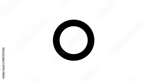 Wallpaper Mural A centered black ring against a clean white backdrop, simple and abstract in design Torontodigital.ca