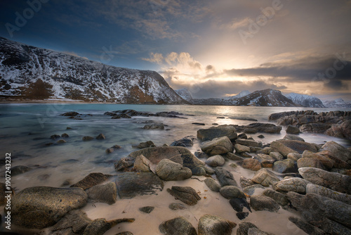 Sand and rocks on beach, Lofoten, Norway