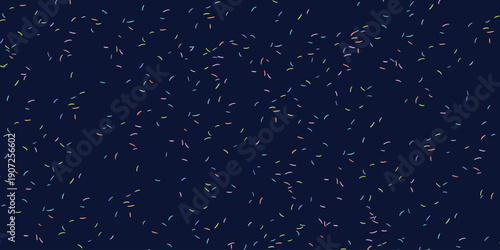 Festive confetti background with small sprayed colourful particles. Irregular vector spots and dots texture with specks