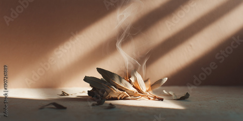 Burning sage incense against a wall creating a tranquil and relaxing atmosphere