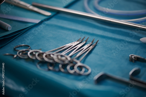 Surgical Suturing Scissors on Operating Table