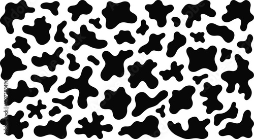 Numerous irregularly shaped black splotches are scattered across a white background in a repeating pattern.