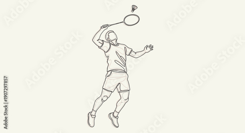 Male badminton player hitting a shuttlecock with a powerful swing in a bright studio setting.